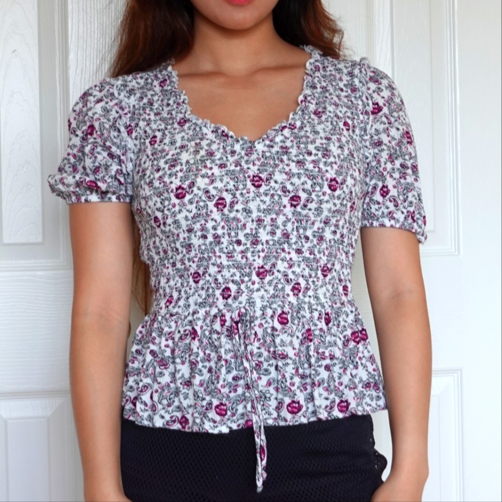 Whote and purple floral peplum top